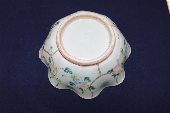 A Chinese celadon glazed dish, a Jun type tripod dish and a famille rose bowl and cover